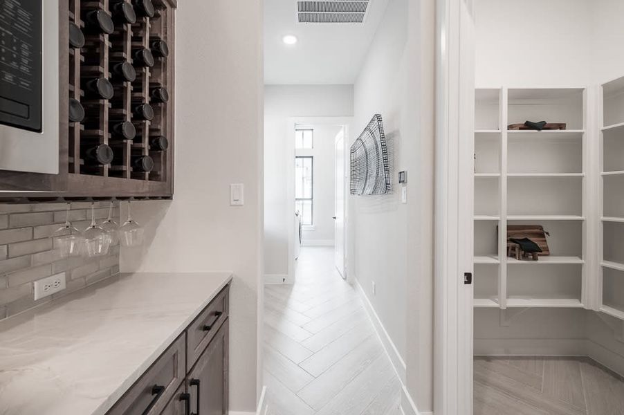 Representative furnished interior of a home built from the Carignan by Tri Pointe Homes in Legacy Grove, Montgomery (Image 51).