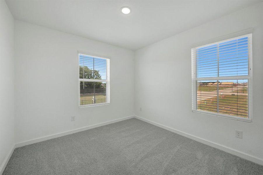 Spacious, unfurnished interior of a new home in Providence Commons, Providence Village (Image 14).