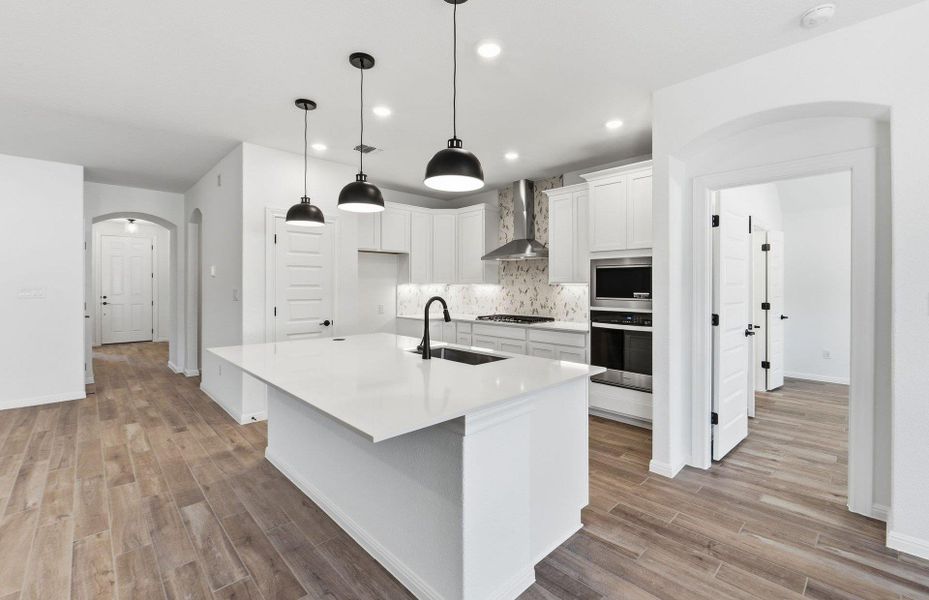 Furnished interior view inside a new home in West Cypress Hills, Spicewood (Image 11).