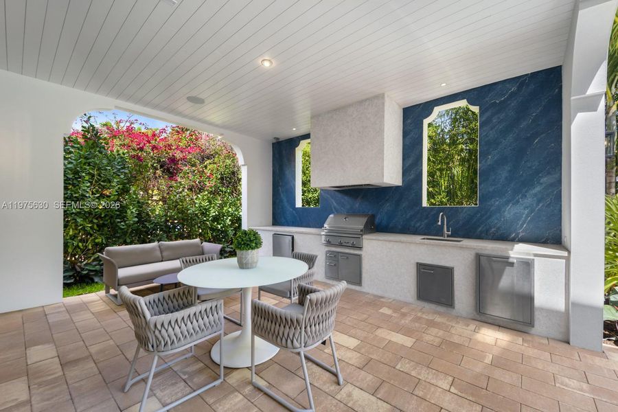 Exterior details and patio area of a home in , Coral Gables (Image 31).