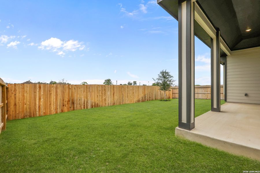 Exterior details and patio area of a home in Megan's Landing, Castroville (Image 4).