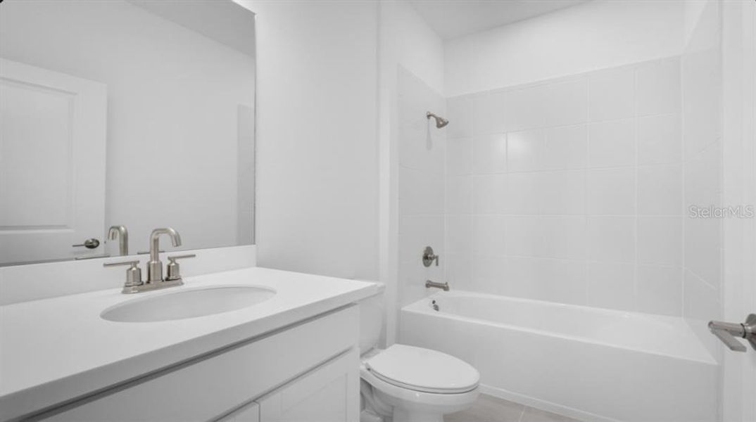 Furnished interior view inside a new home in The Cove at West Port, Port Charlotte (Image 10).