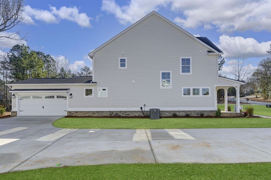 Front exterior of a new home in Clubside Reserve at Summerlake, Lexington, SC, highlighting curb appeal (Image 31).