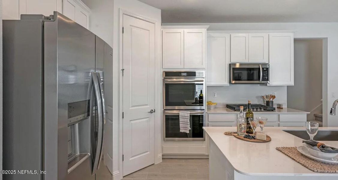 Furnished interior view inside a new home in Granary Park, Green Cove Springs (Image 16).