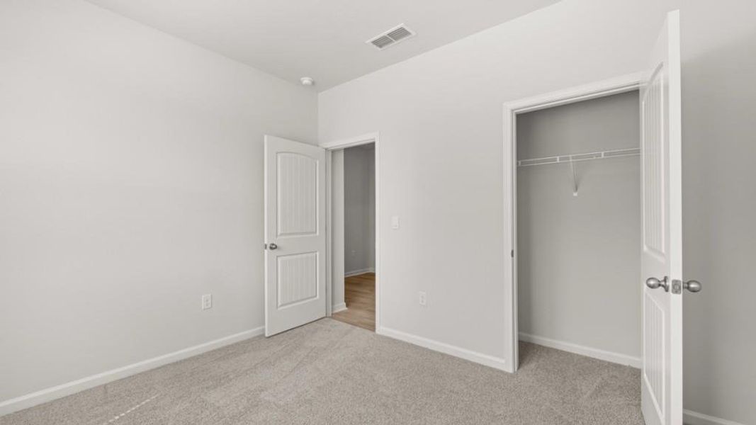 Spacious, unfurnished interior of a new home in Oaks at Cedar Grove, Fairburn (Image 22).