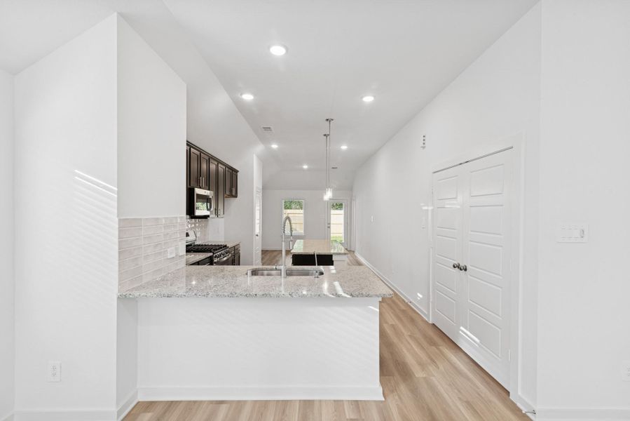 Furnished interior view inside a new home in Pinewood at Grand Texas, New Caney (Image 4). Furnished interior view inside a new home in Pinewood at Grand Texas, New Caney (Image 4).