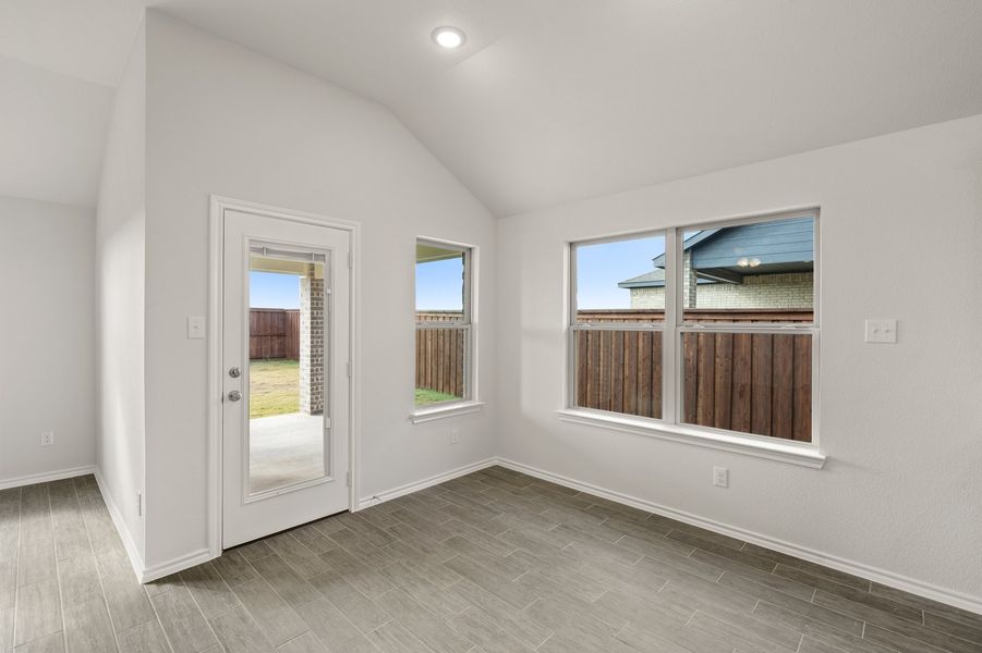 Front exterior of a new home in Myrtle Creek, Waxahachie, TX, highlighting curb appeal (Image 19). Front exterior of a new home in Myrtle Creek, Waxahachie, TX, highlighting curb appeal (Image 19).