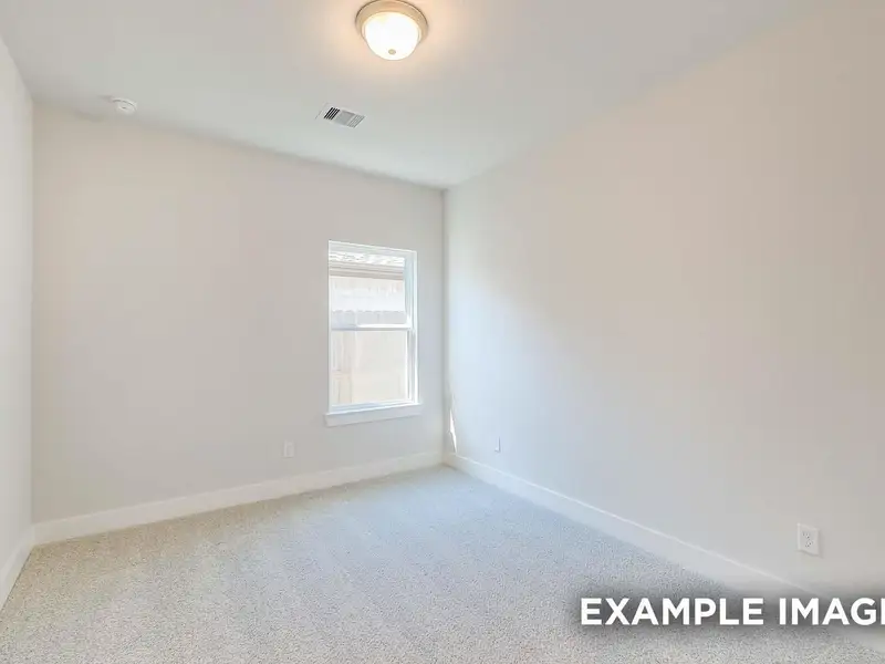 Spacious, unfurnished interior of a new home in Sunterra, Katy (Image 22).