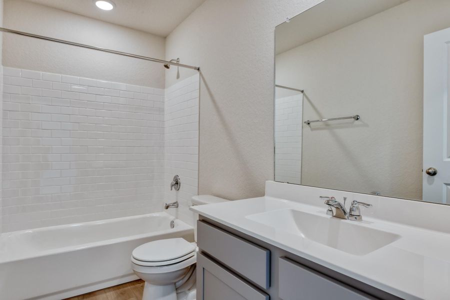 Representative furnished interior of a home built from the McKinney by Ashton Woods in Meadows at Hennersby Hollow 40's, San Antonio (Image 9).