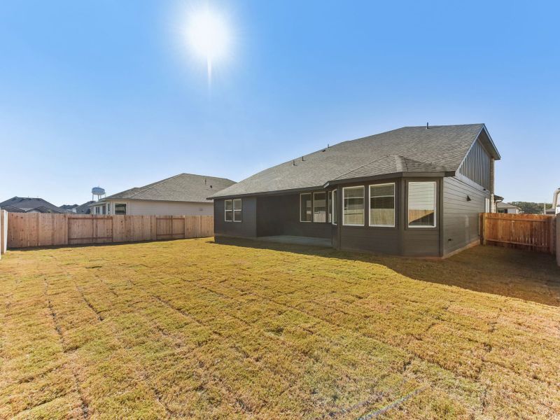 Exterior details and patio area of a home in Opal Meadows, Kyle (Image 3).