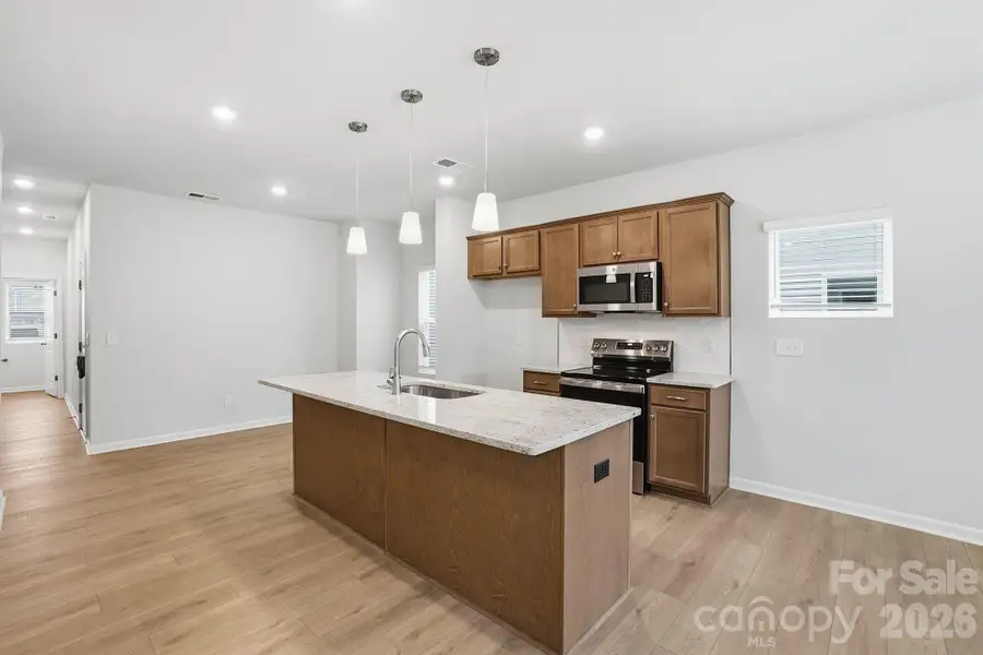 Furnished interior view inside a new home in Sloan Station, Charlotte (Image 6).