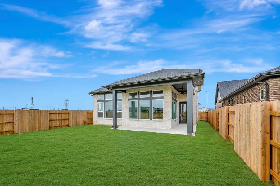 Exterior details and patio area of a home in Elyson - Reserve Collection, Katy (Image 4).