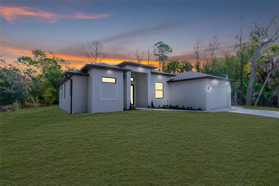 Front exterior of a new home in , Port Charlotte, FL, highlighting curb appeal (Image 22).