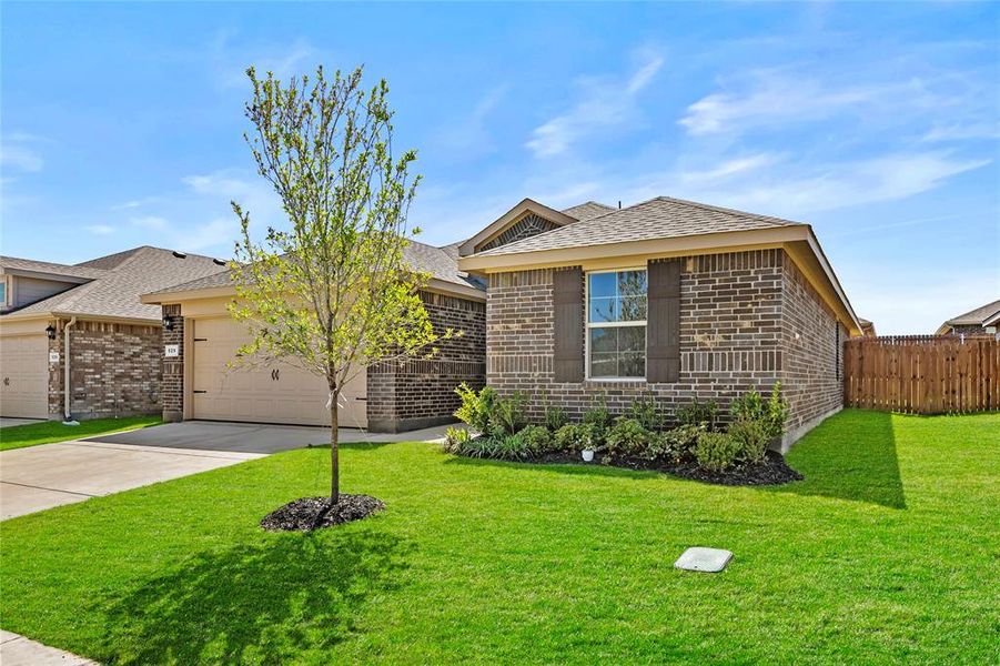 Front exterior of a new home in Meadowbrook Estates, Cleburne, TX, highlighting curb appeal (Image 2).