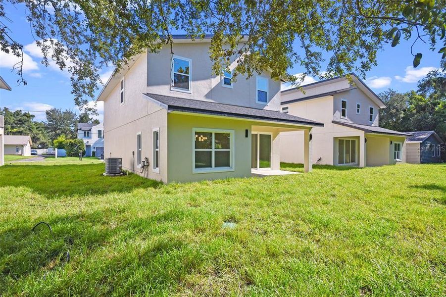 Front exterior of a new home in , Orlando, FL, highlighting curb appeal (Image 27).