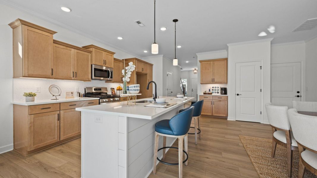 Representative furnished interior of a home built from the Victoria by Epcon Communities in Village at Maple Leaf Farm, King (Image 10).