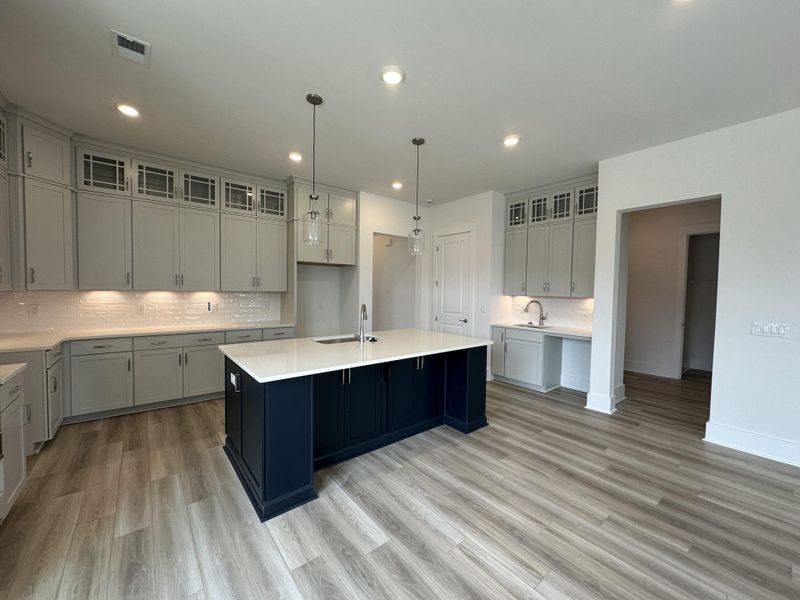 Furnished interior view inside a new home in Summerwind Crossing at Lakes of Cane Bay, Summerville (Image 4).