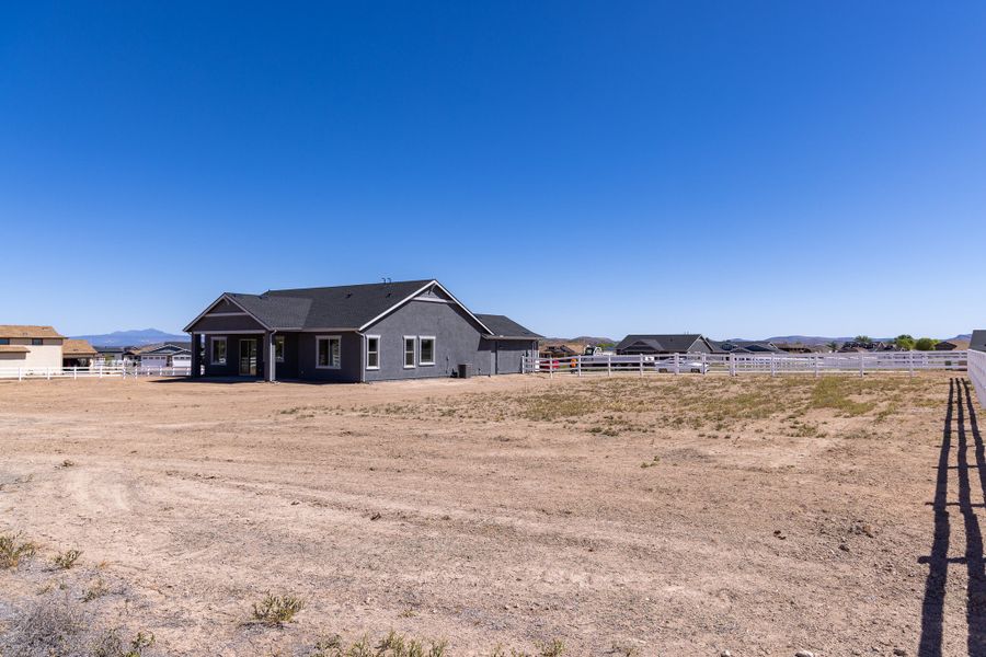 Exterior details and patio area of a home in Heritage Pointe, Chino Valley (Image 25).