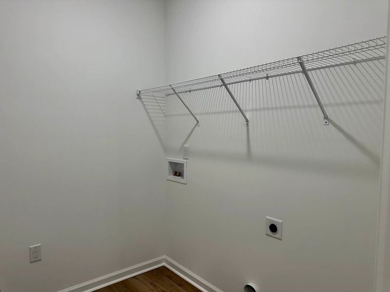 Laundry Room featuring the AW Collection® Harmony - Functional space with a refined touch. Laundry Room featuring the AW Collection® Harmony - Functional space with a refined touch.