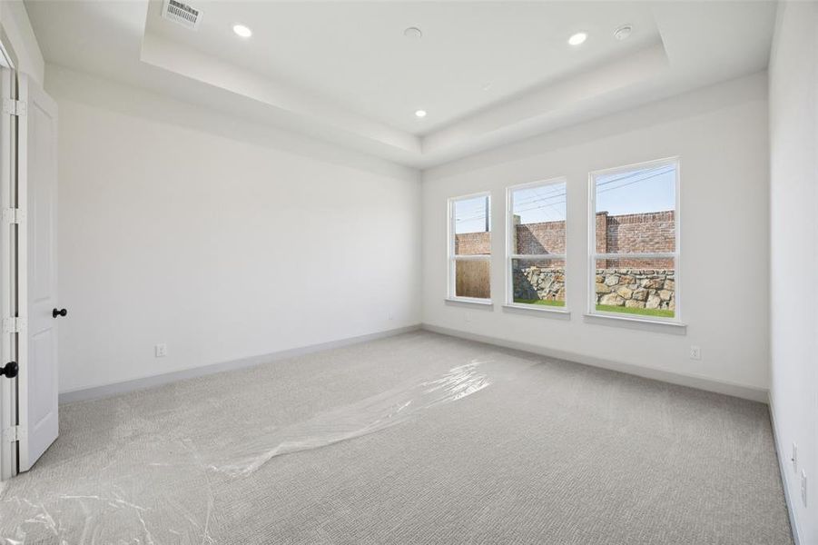 Located at the rear of the home for additional privacy, this owner's suite was designed for rest and relaxation.