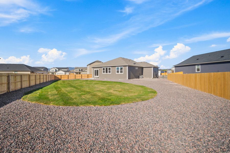 Exterior details and patio area of a home in The Glen, Colorado Springs (Image 19).