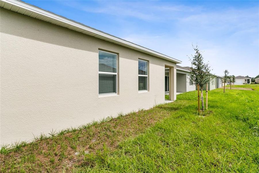 Exterior details and patio area of a home in Lake Deer Estates, Poinciana (Image 18).