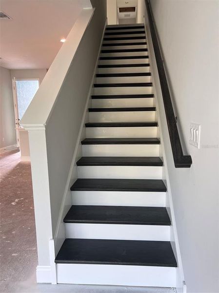 Spacious, unfurnished interior of a new home in The Towns At Long Bayou, Seminole (Image 7).