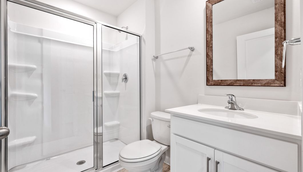 Furnished interior view inside a new home in Lakestone, Woodruff (Image 12).
