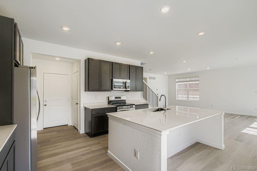 Furnished interior view inside a new home in Ken-Caryl Ranch: The Pioneer Collection, Littleton (Image 6).