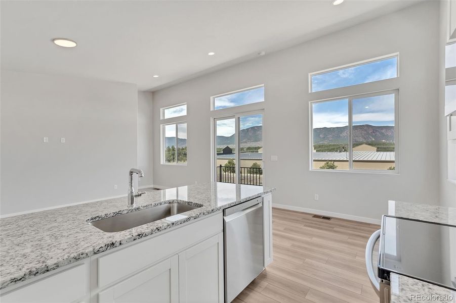 Furnished interior view inside a new home in , Monument (Image 10).