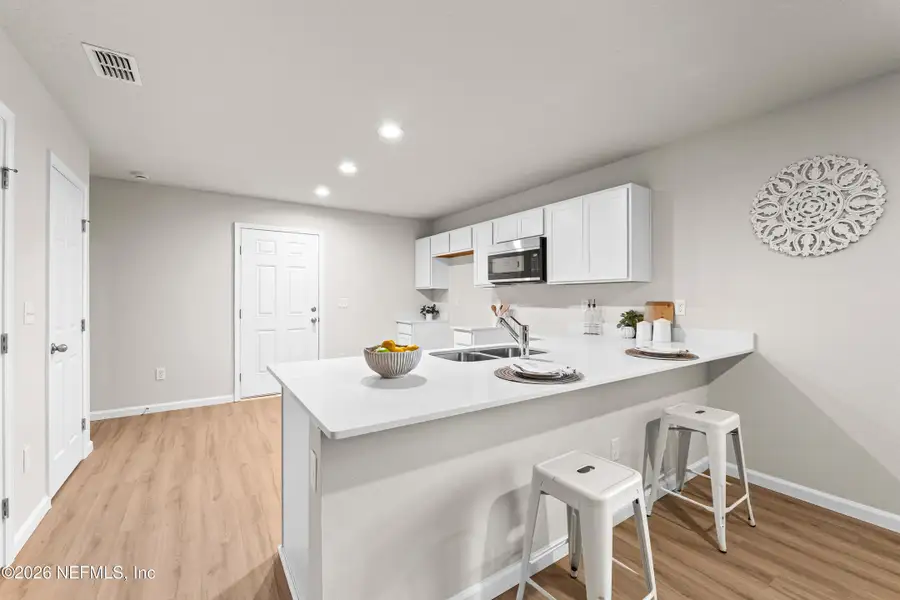 Furnished interior view inside a new home in , Jacksonville (Image 12). Furnished interior view inside a new home in , Jacksonville (Image 12).