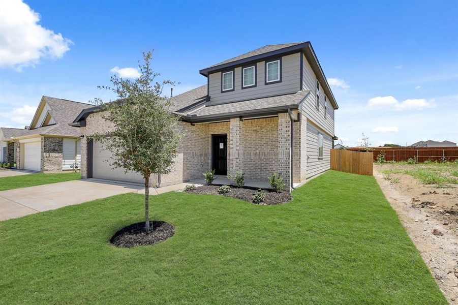 Front exterior of a new home in Rocky Creek Crossing, Fort Worth, TX, highlighting curb appeal (Image 2). Front exterior of a new home in Rocky Creek Crossing, Fort Worth, TX, highlighting curb appeal (Image 2).