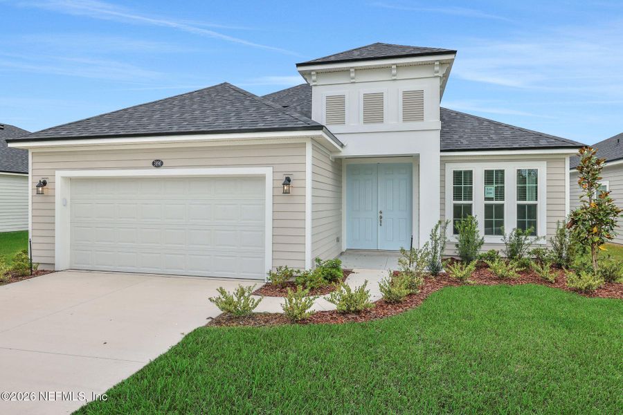 Front exterior of a new home in Amberly, Green Cove Springs, FL, highlighting curb appeal (Image 23).