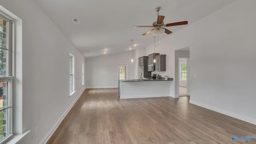 Representative unfurnished interior of a home built from the 1434 by Adams Homes in The Grove at Ballard Park, Jacksonville (Image 10).