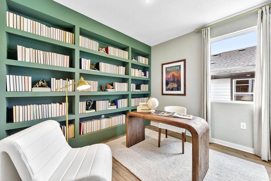 Built-in shelving creates a distinguished study, perfect for quiet work or reading.