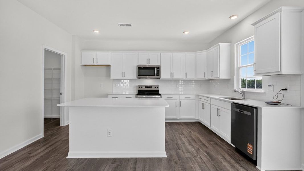 Furnished interior view inside a new home in The Reserve at Prestleigh, Wake Forest (Image 5).