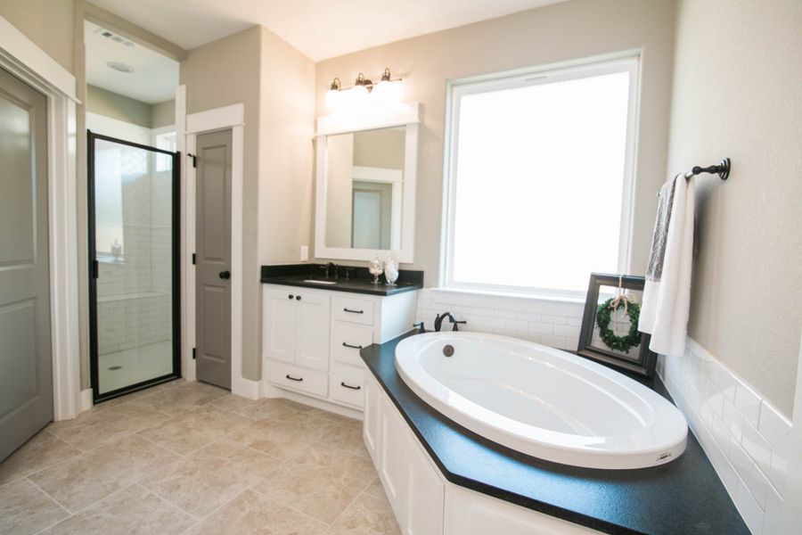 Representative furnished interior of a home built from the The Ashley by Reece Homes in Oakmont, Bryan (Image 18).