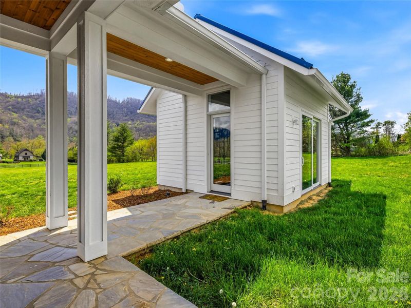 Exterior details and patio area of a home in , Fletcher (Image 21).