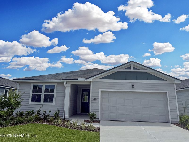 Front exterior of a new home in Sandridge Hills, Green Cove Springs, FL, highlighting curb appeal (Image 1).