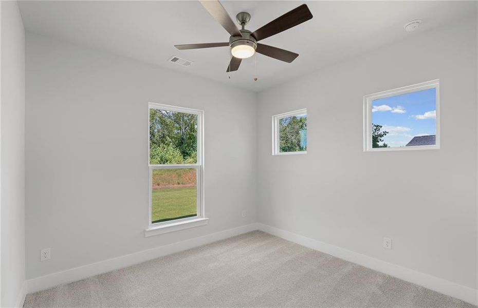 Spacious, unfurnished interior of a new home in Creekside at Skelton, Jefferson (Image 12).