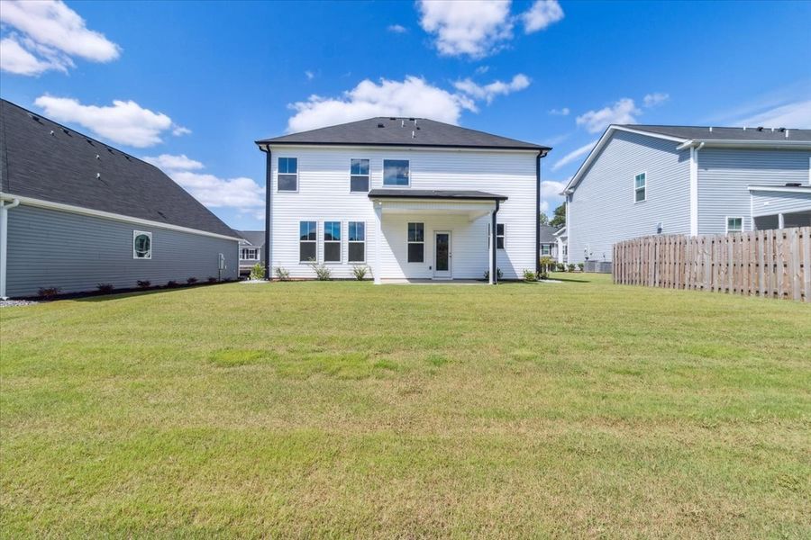 Front exterior of a new home in Windsor, North Augusta, SC, highlighting curb appeal (Image 20). Front exterior of a new home in Windsor, North Augusta, SC, highlighting curb appeal (Image 20).
