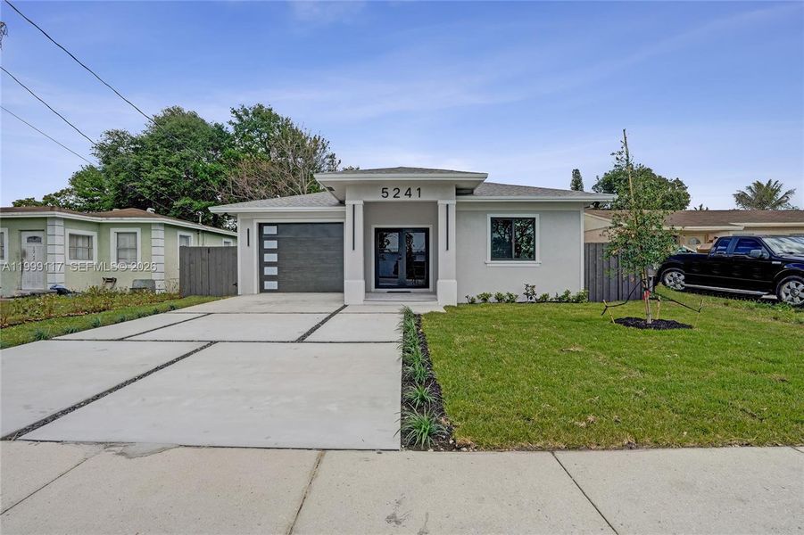 Front exterior of a new home in , West Park, FL, highlighting curb appeal (Image 28).