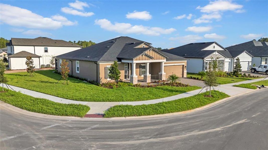 Front exterior of a new home in , Wesley Chapel, FL, highlighting curb appeal (Image 18). Front exterior of a new home in , Wesley Chapel, FL, highlighting curb appeal (Image 18).
