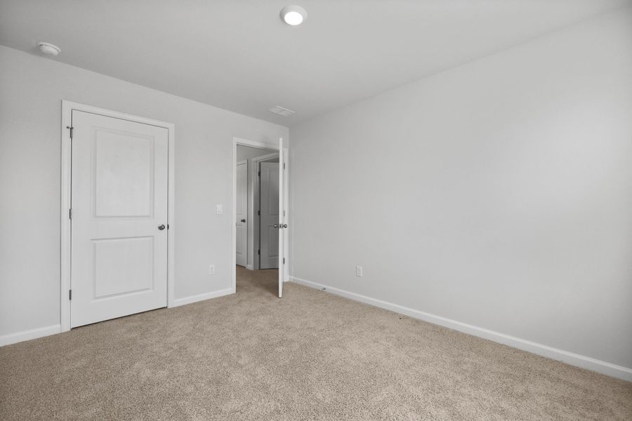 Spacious, unfurnished interior of a new home in Pine Hills at Cane Bay, Summerville (Image 20).