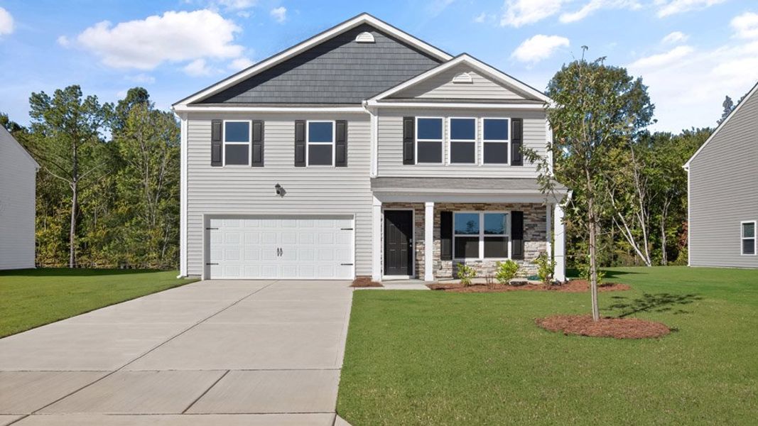 Front exterior of a new home in Olive Branch, Clayton, NC, highlighting curb appeal (Image 16). Front exterior of a new home in Olive Branch, Clayton, NC, highlighting curb appeal (Image 16).