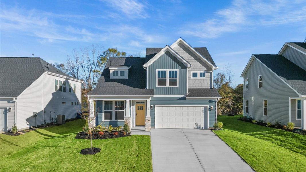 First-rate curb appeal with clean lines and a welcoming front entry First-rate curb appeal with clean lines and a welcoming front entry