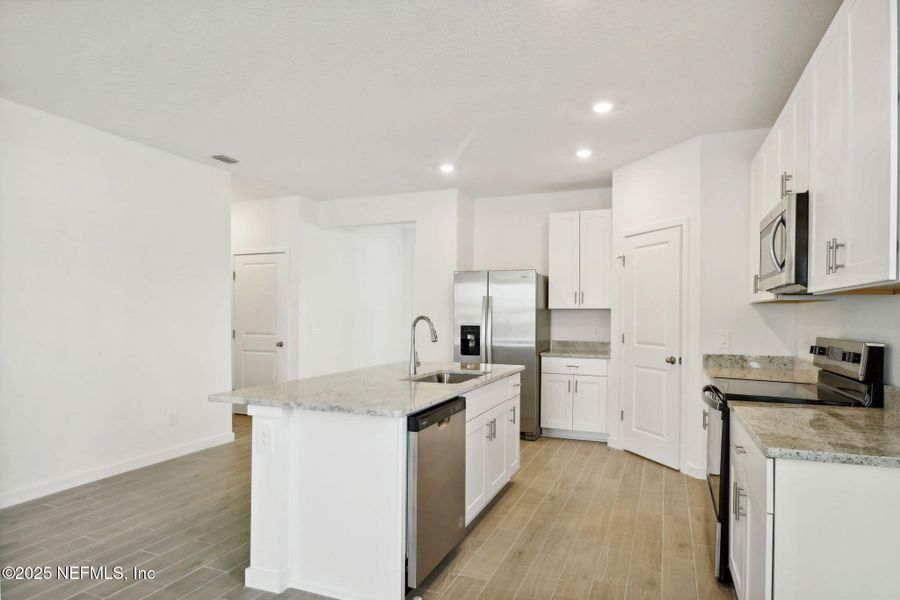 Furnished interior view inside a new home in Cypress Meadows - Signature Series, Jacksonville (Image 6).