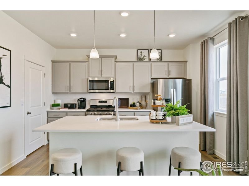 Furnished interior view inside a new home in Settlers Crossing, Commerce City (Image 14).