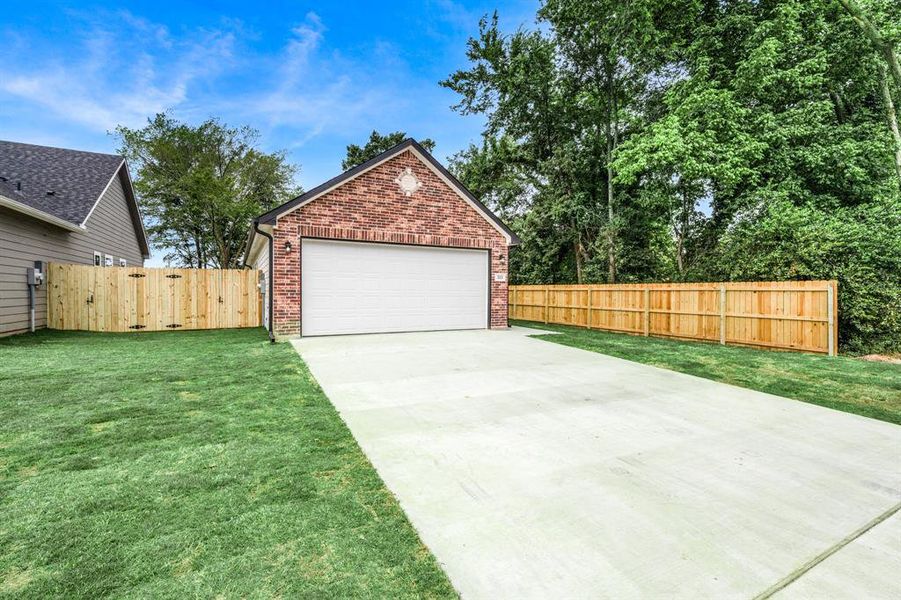 Front exterior of a new home in , Sulphur Springs, TX, highlighting curb appeal (Image 22). Front exterior of a new home in , Sulphur Springs, TX, highlighting curb appeal (Image 22).