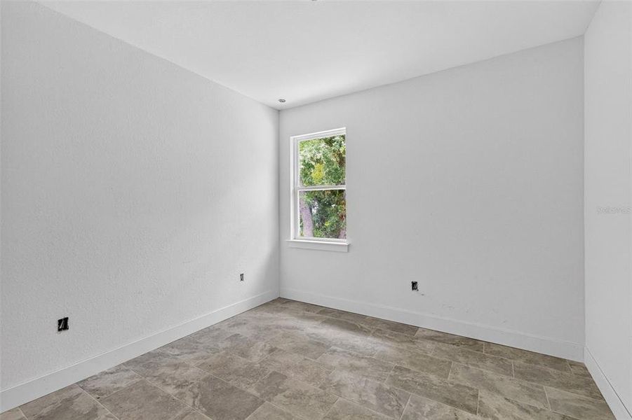 Spacious, unfurnished interior of a new home in , Port Charlotte (Image 18).